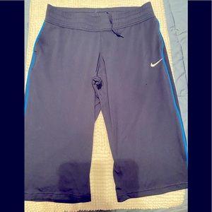 Nike Capri’s  Navy blue Dri Fit material. Large